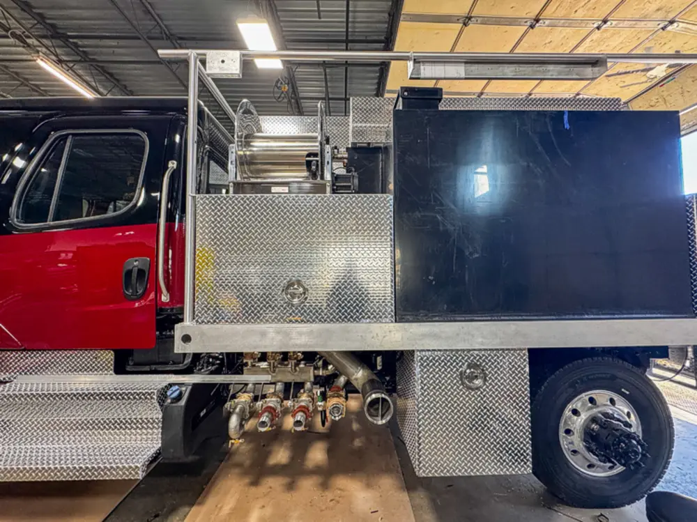 Pump and plumbing components during installation, photo 93 of 303.